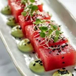 Avocado-Wasabi Cream served with Watermelon 'Tuna' dish garnish.