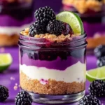 Delicious blackberry lime cheesecake jars with fresh berries