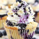Delicious blueberry cream cheese cupcakes decorated with frosting.
