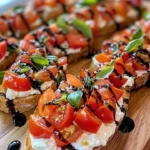 Delicious burrata bruschettas with fresh toppings on a rustic wooden table