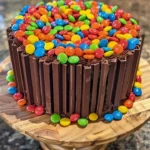 Chocolate M&M Celebration Cake with colorful candy coating