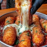 Delicious crispy mozzarella sticks with marinara sauce and creamy dip