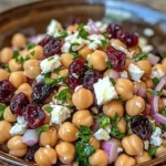 Feta cranberry chickpeas salad with lemon vinaigrette and fresh greens