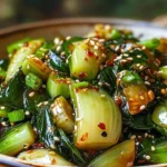 Ginger Garlic Bok Choy Stir-Fry served in a bowl with chopsticks