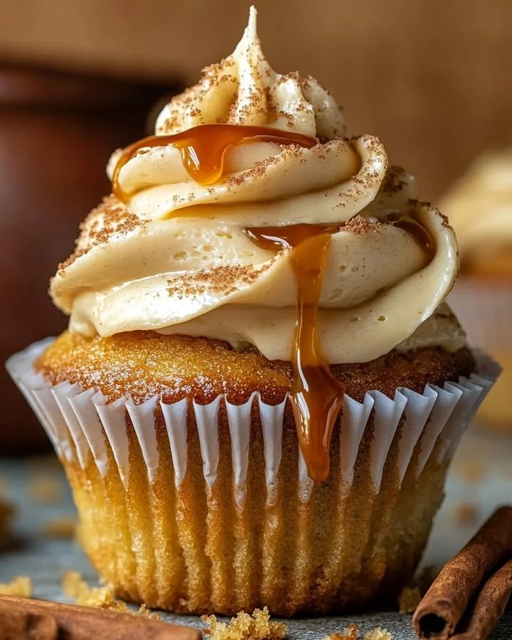 Delicious Harry Potter Butterbeer Cupcakes topped with creamy frosting