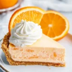 Delicious Jello Creamsicle Pie with creamy orange layers and whipped topping
