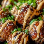 Delicious Korean BBQ meatballs with spicy mayo dip served on a plate