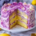 Lavender Lemon Cream Cake with white chocolate frosting, beautifully decorated and presented.