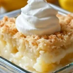 Delicious Lemon Cream Cheese Dump Cake topped with creamy frosting and lemon zest