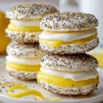 Lemon and poppy seed meringue sandwiches on a white plate