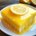 Lemon Sunshine Glaze Cake topped with fresh citrus glaze and lemon zest.