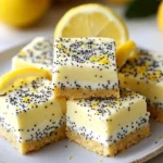 Low sugar lemon poppy seed Greek yogurt bars on a plate