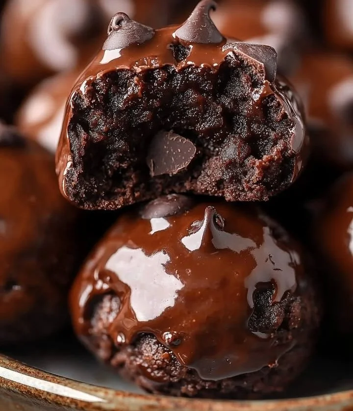 No-bake cottage cheese brownie batter protein bites served in a bowl.