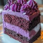 A beautifully decorated Purple Velvet Cake with creamy frosting.