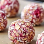 Raspberry Almond Energy Bites, a nutritious snack made with berries and almonds.