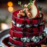 Elegant roasted beet and blue cheese towers served as a gourmet appetizer.