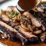Slow cooker brisket with balsamic onion gravy served on a plate