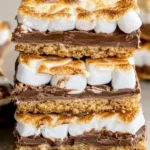 Deliciously stacked S'mores Crack Bars with chocolate, marshmallows, and graham crackers.