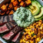 Steak bowl with avocado, roasted corn, and cilantro cream sauce