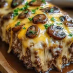 Ultimate Mushroom Swiss Cheese Meatloaf served with sides